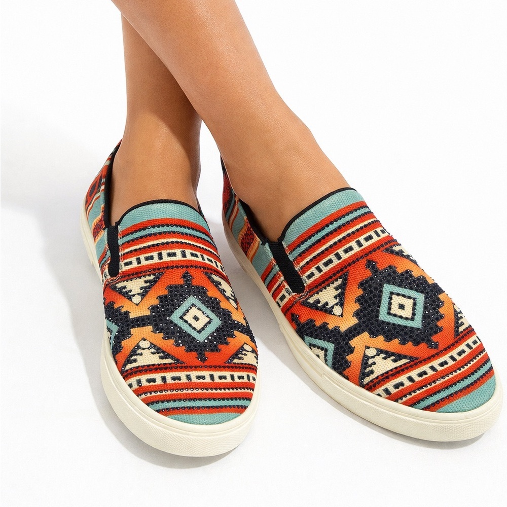 New in box slip in Navaho sneaker.  Montana West women size 10.